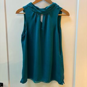 White House Black Market Teal Sleeveless silk top
Women's size S